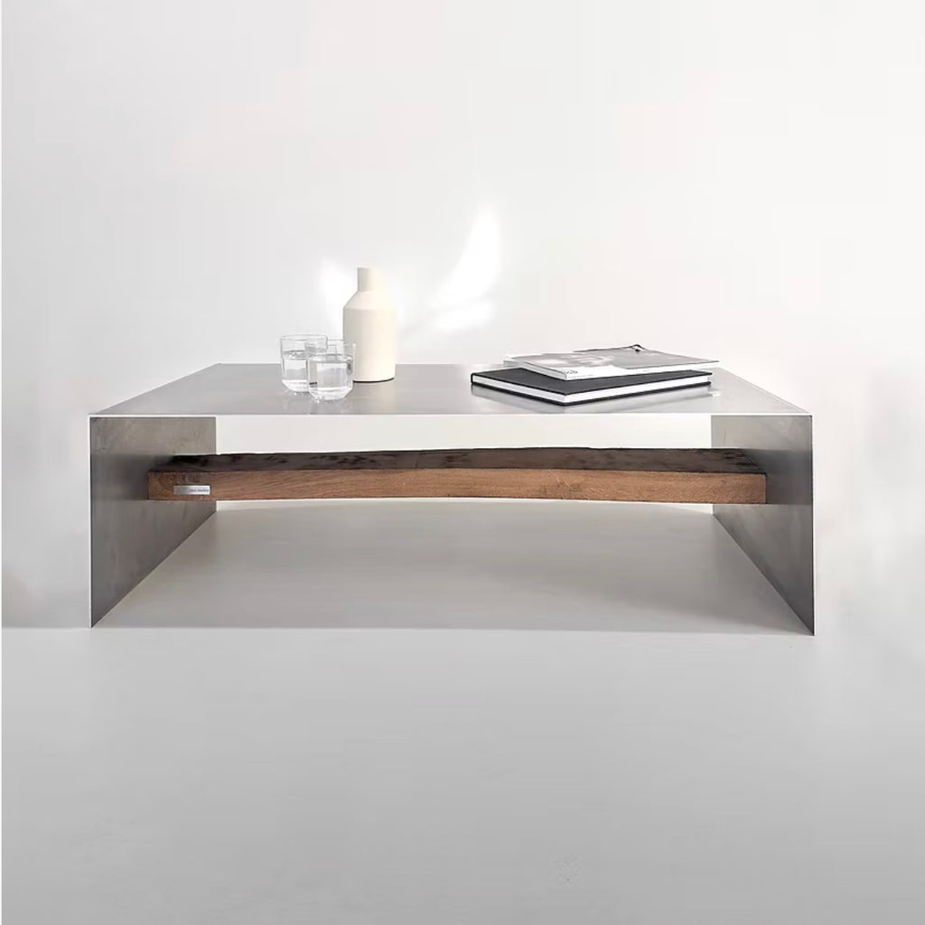 Monolith steel coffee table with bold minimal design, precision-cut metal construction, industrial center table for modern living room