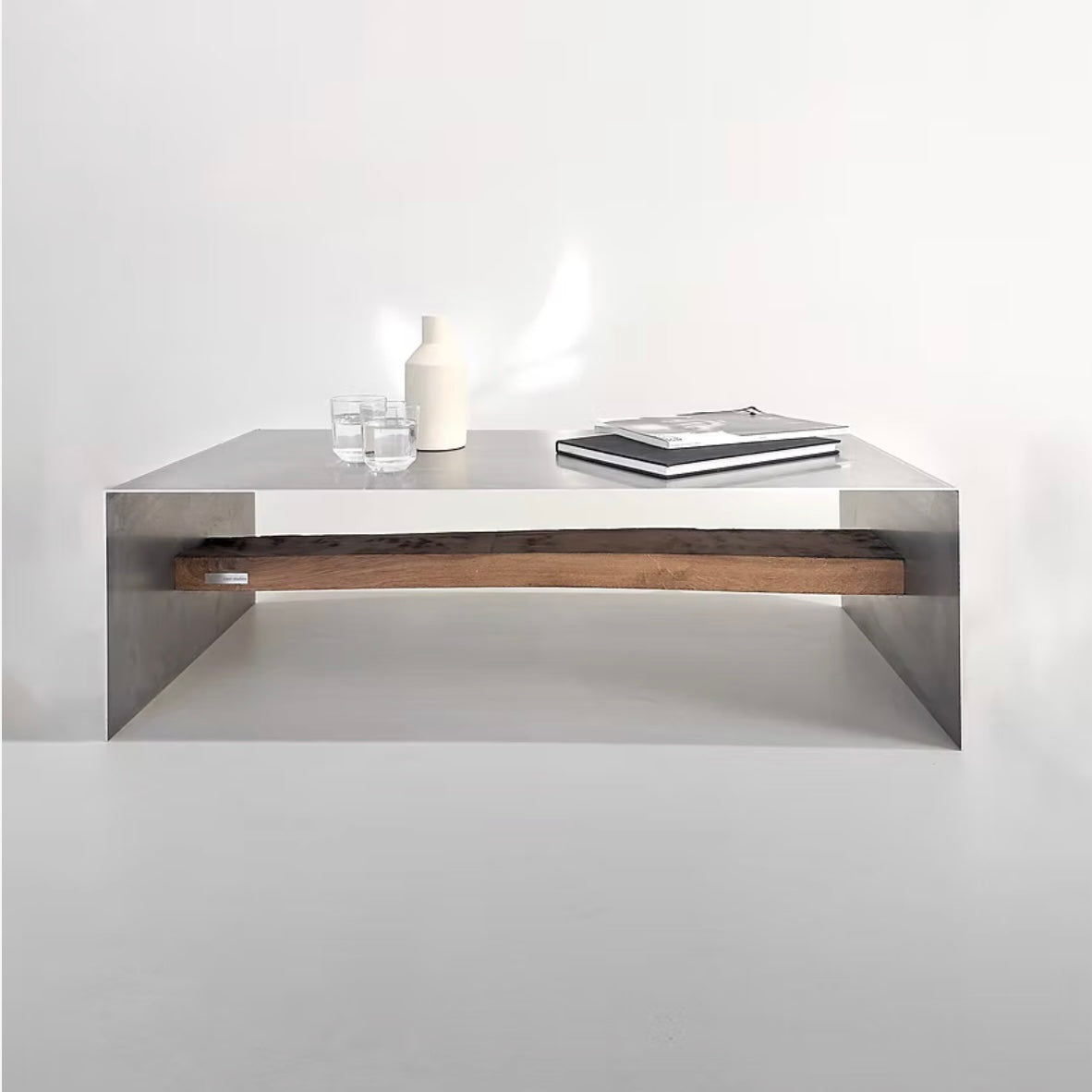 Monolith steel coffee table with bold minimal design, precision-cut metal construction, industrial center table for modern living room