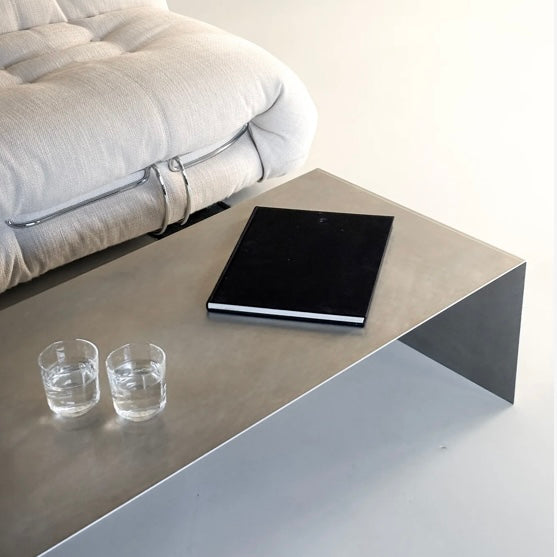Monolith steel coffee table with bold minimal design, precision-cut metal construction, industrial center table for modern living room