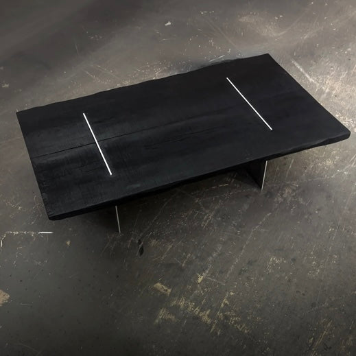 Charred wood coffee table with burnt finish surface, solid wood construction, modern rustic center table for living room