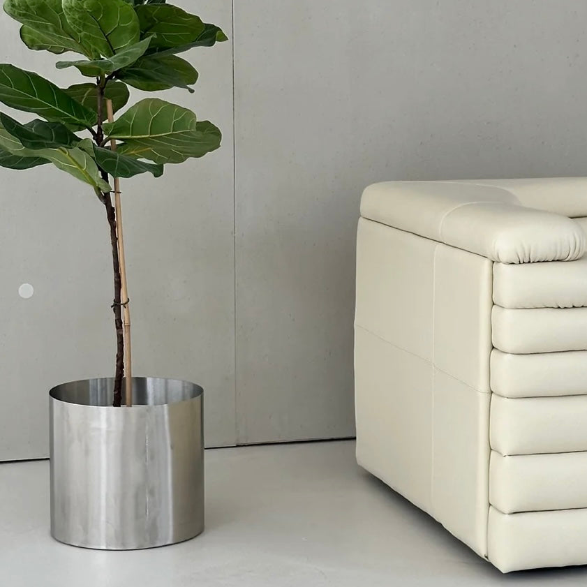 Minimal steel metal flower pot with clean industrial design, durable precision-formed construction, modern planter for indoor plants and contemporary interiors
