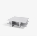 Metal grid coffee table with structured steel lattice design, precision-cut construction, industrial modern center table for living room