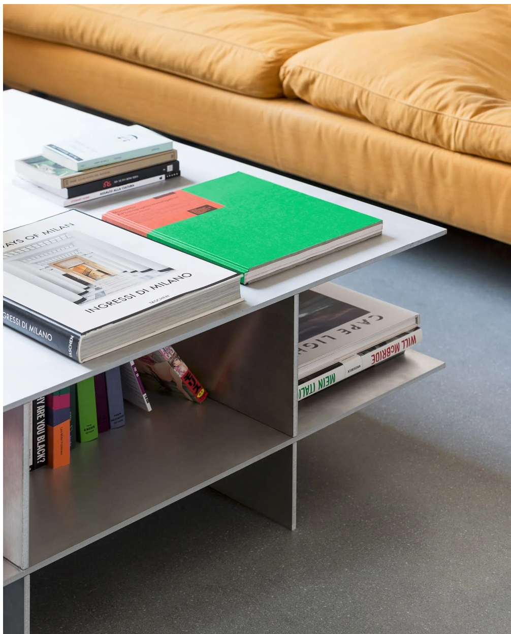 Metal grid coffee table with structured steel lattice design, precision-cut construction, industrial modern center table for living room