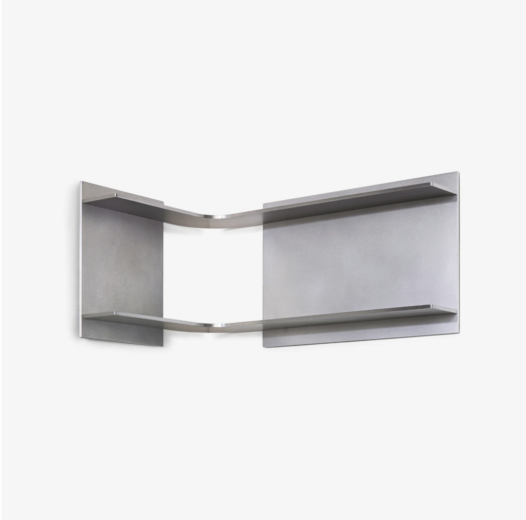 Wall-mounted metal corner shelf with space-saving design, precision-cut steel construction, minimal industrial storage for kitchen, bathroom, or modern interior