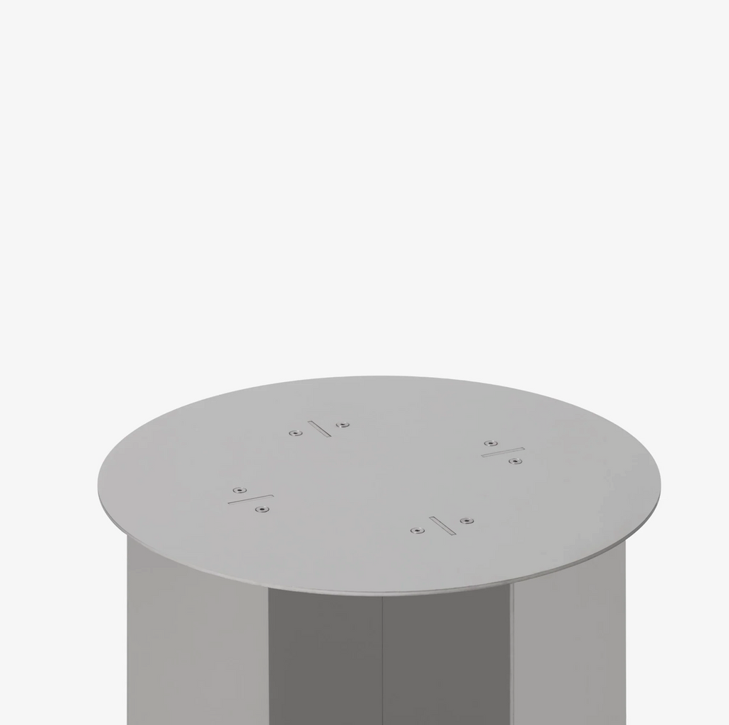Round radial steel side table with geometric base design, minimal industrial look, precision-cut metal construction, modern side table for living room or bedroom
