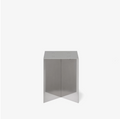 Modern side table with a reflective surface on a white background
Interlocked steel side table with slot-and-lock design, minimal industrial look, precision-cut metal construction, modern bedside table for living room or bedroom