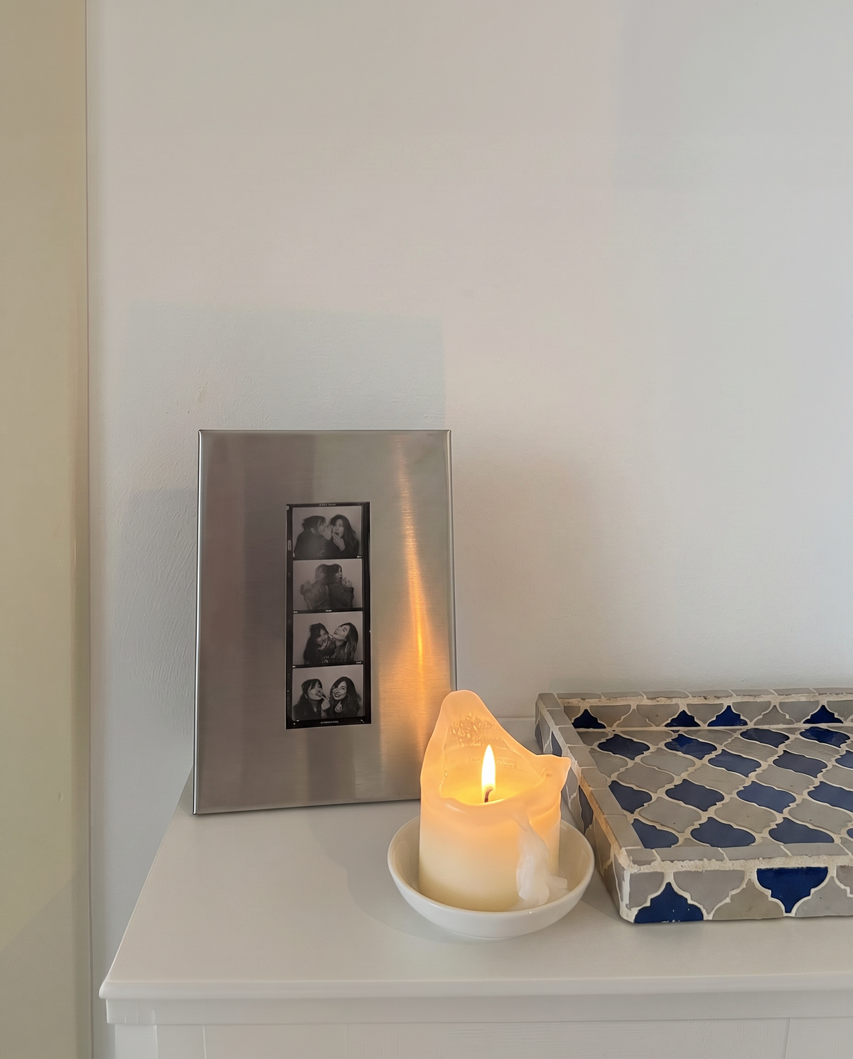 SteelHaus stainless steel photo frame – styled on wall