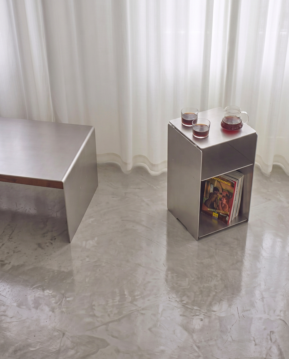 SteelHaus Anodized Side Table – styled as bedside table